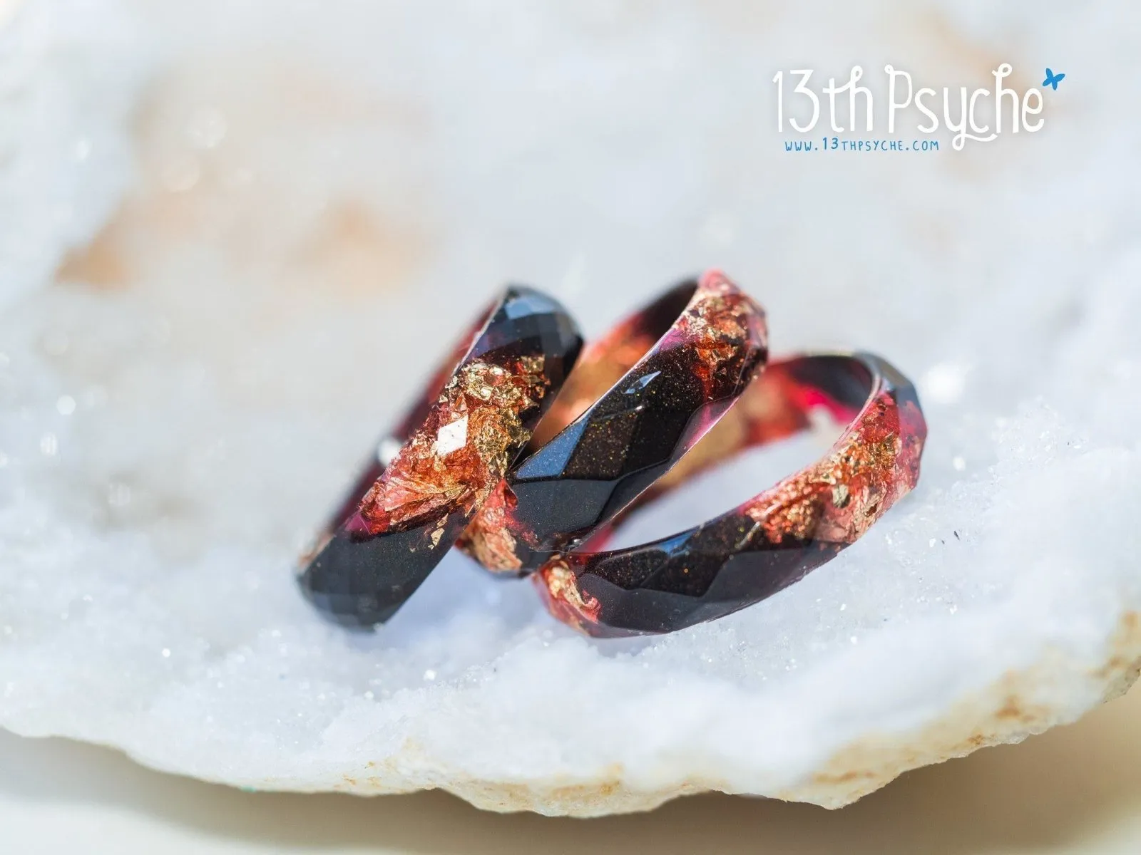 Black and red faceted resin ring with gold flakes