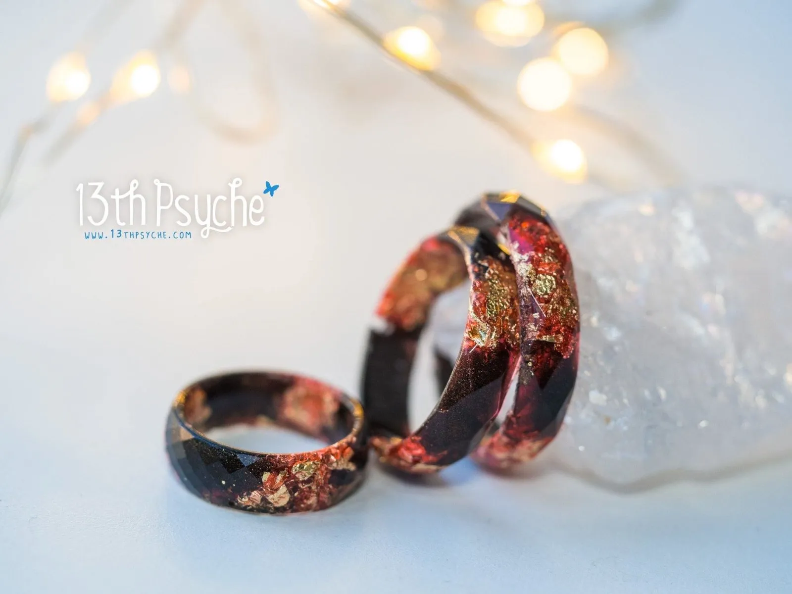 Black and red faceted resin ring with gold flakes