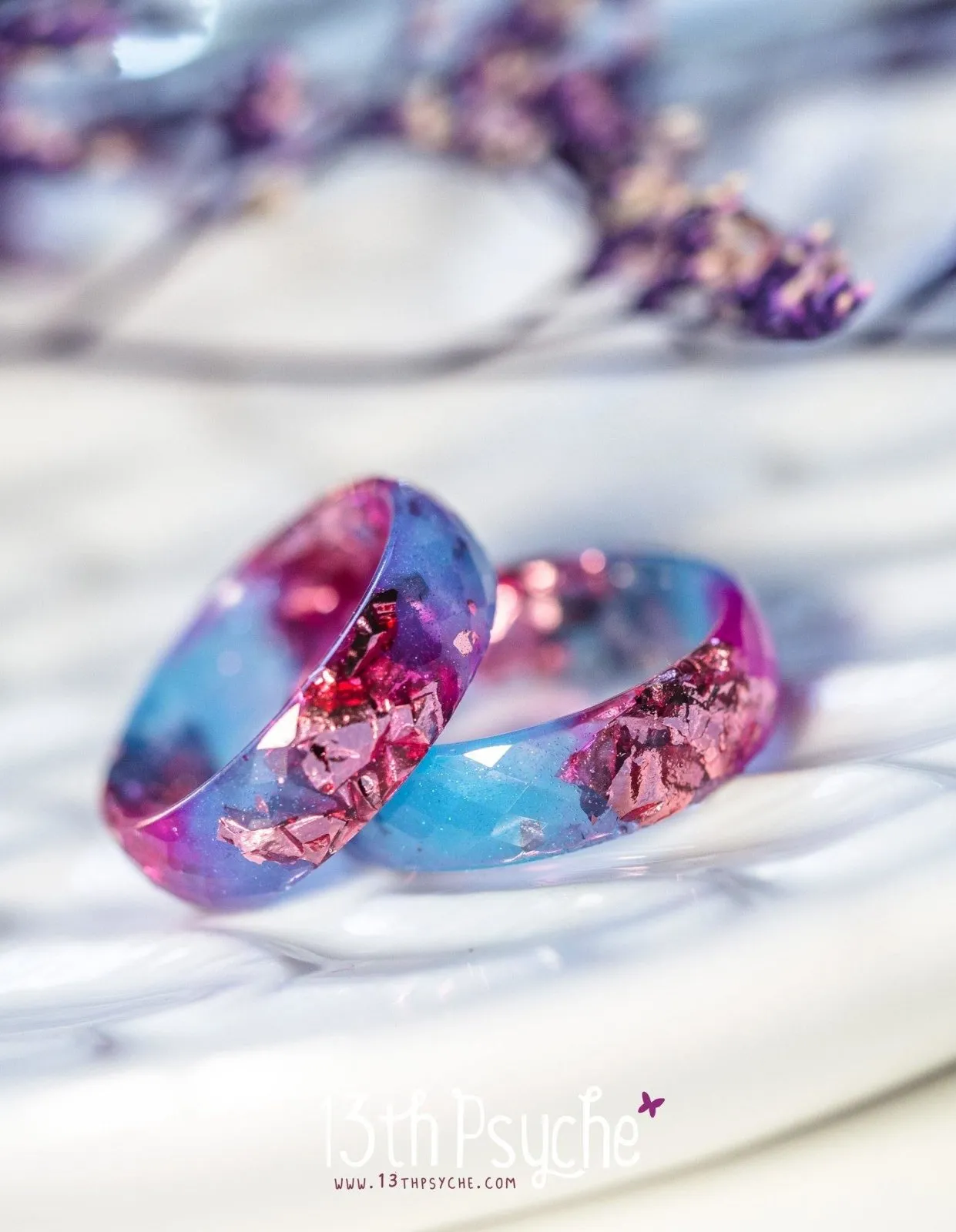 Blue and fuschia faceted resin ring with pink metallic flakes