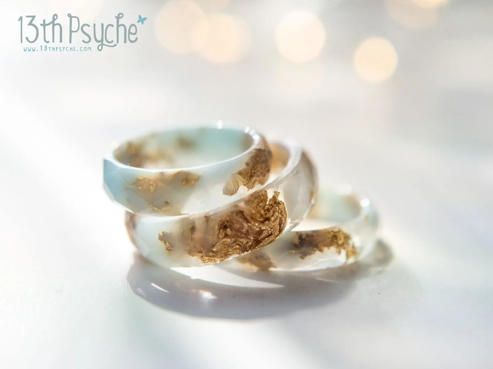 Clear and Pale blue faceted resin ring with gold flakes