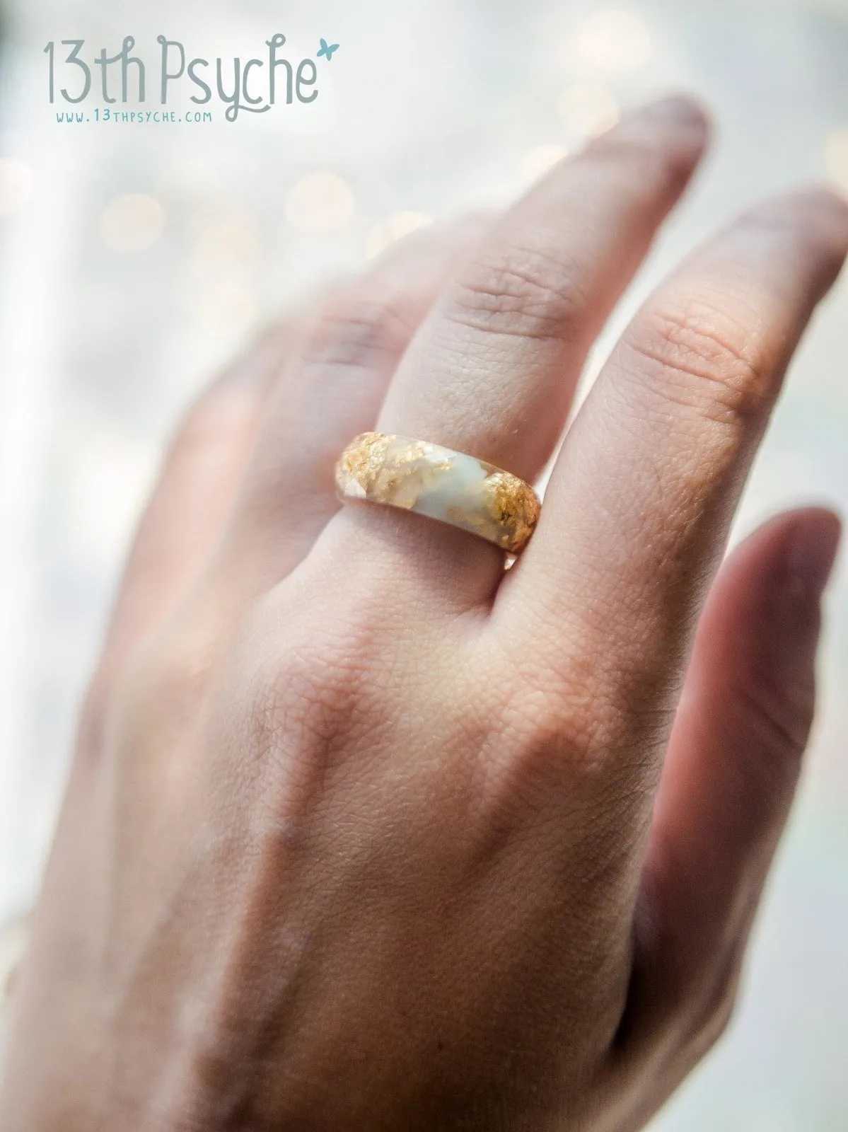 Clear and Pale blue faceted resin ring with gold flakes