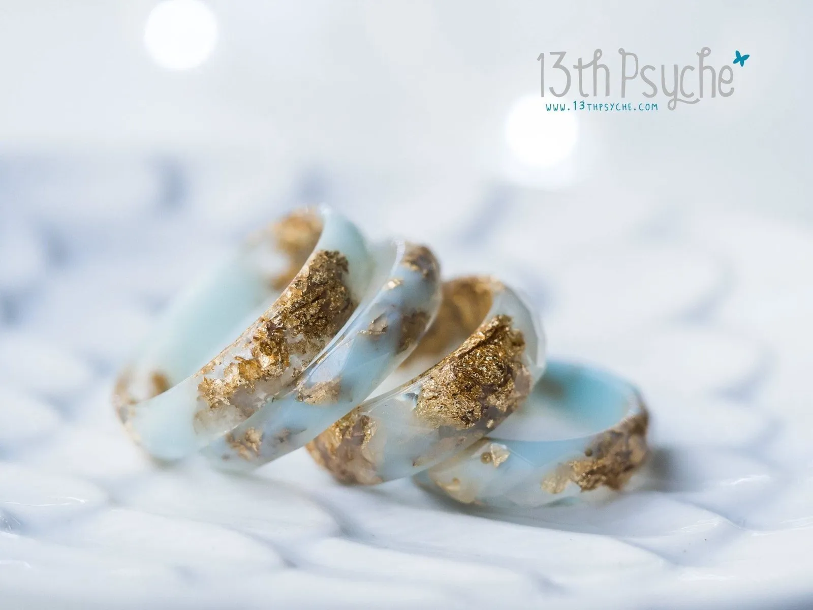 Clear and Pale blue faceted resin ring with gold flakes