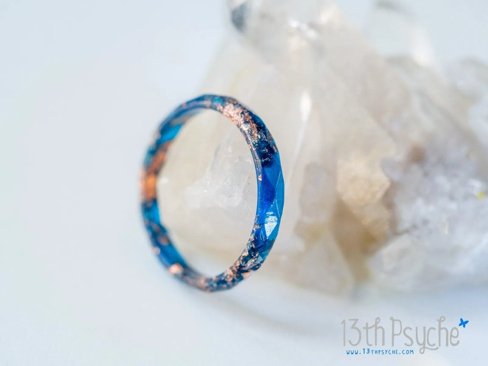 Dark blue and rose gold flakes faceted resin ring