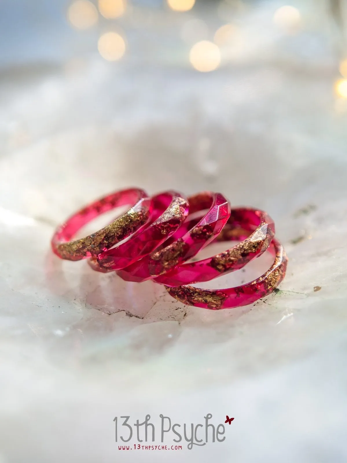 Dark red and gold flakes faceted resin ring