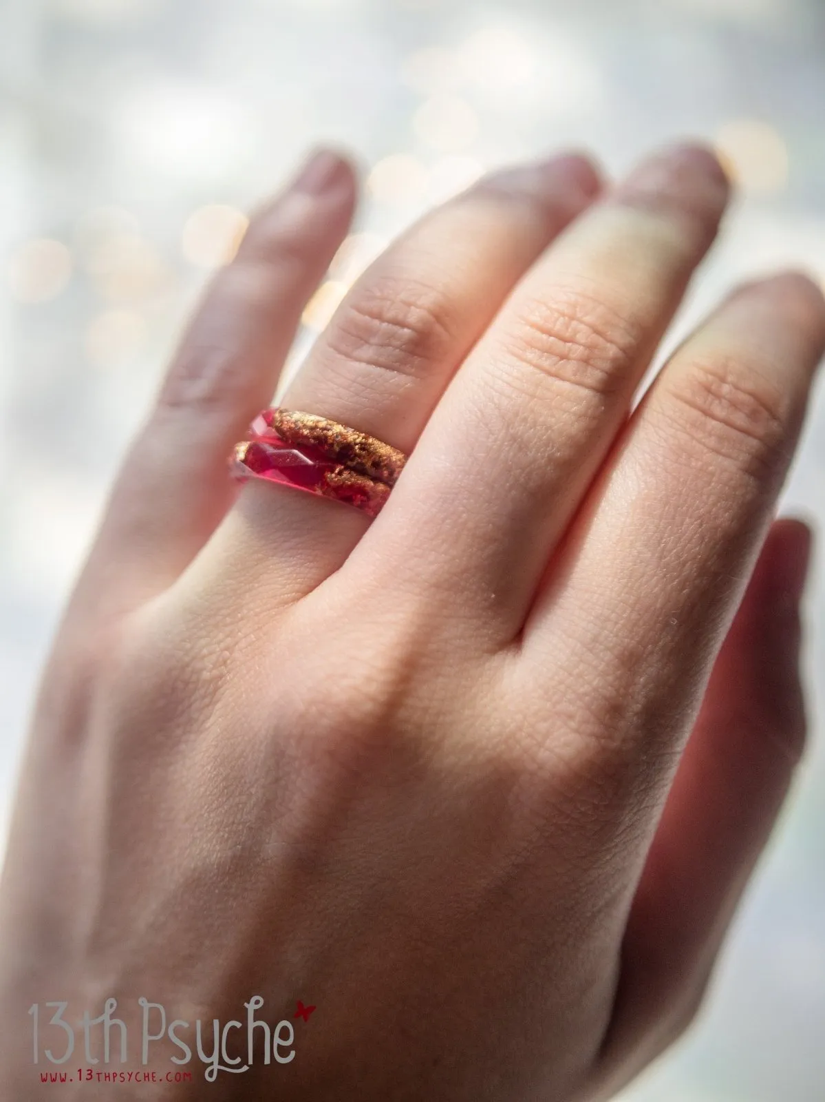 Dark red and gold flakes faceted resin ring