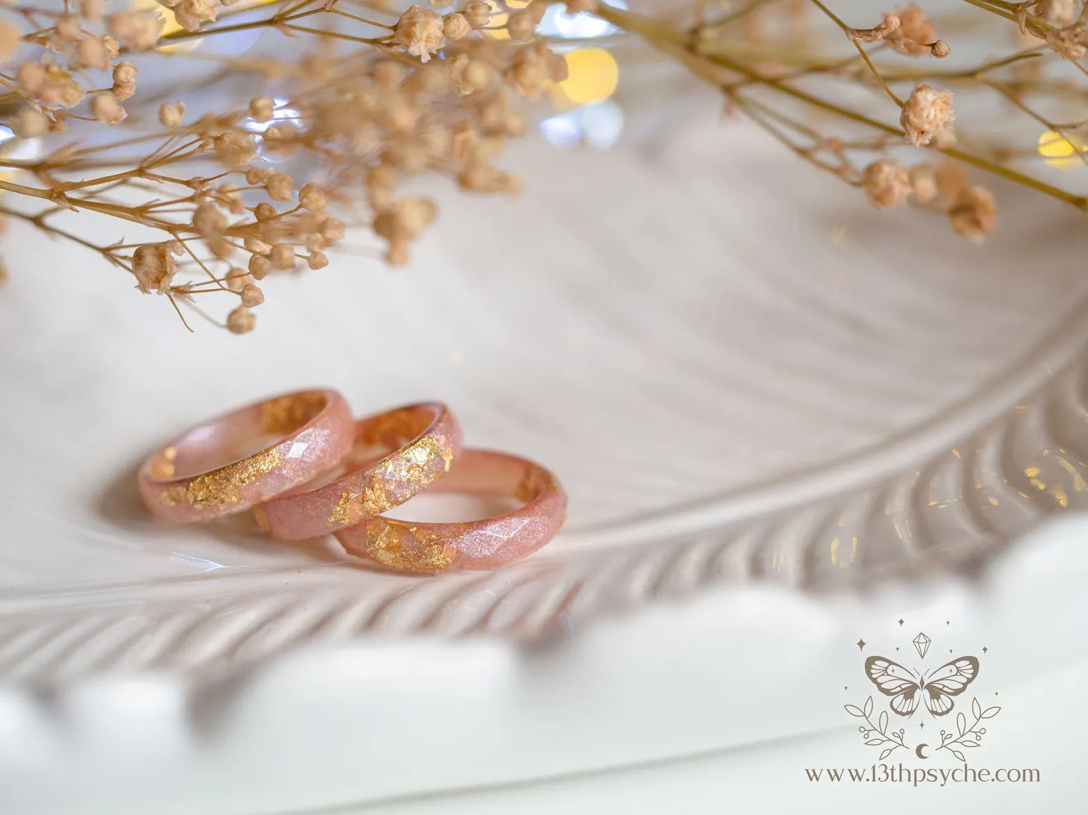 Iridescent pink faceted resin ring with gold metal flakes