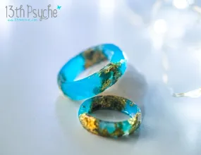 Light blue and gold flakes faceted resin ring