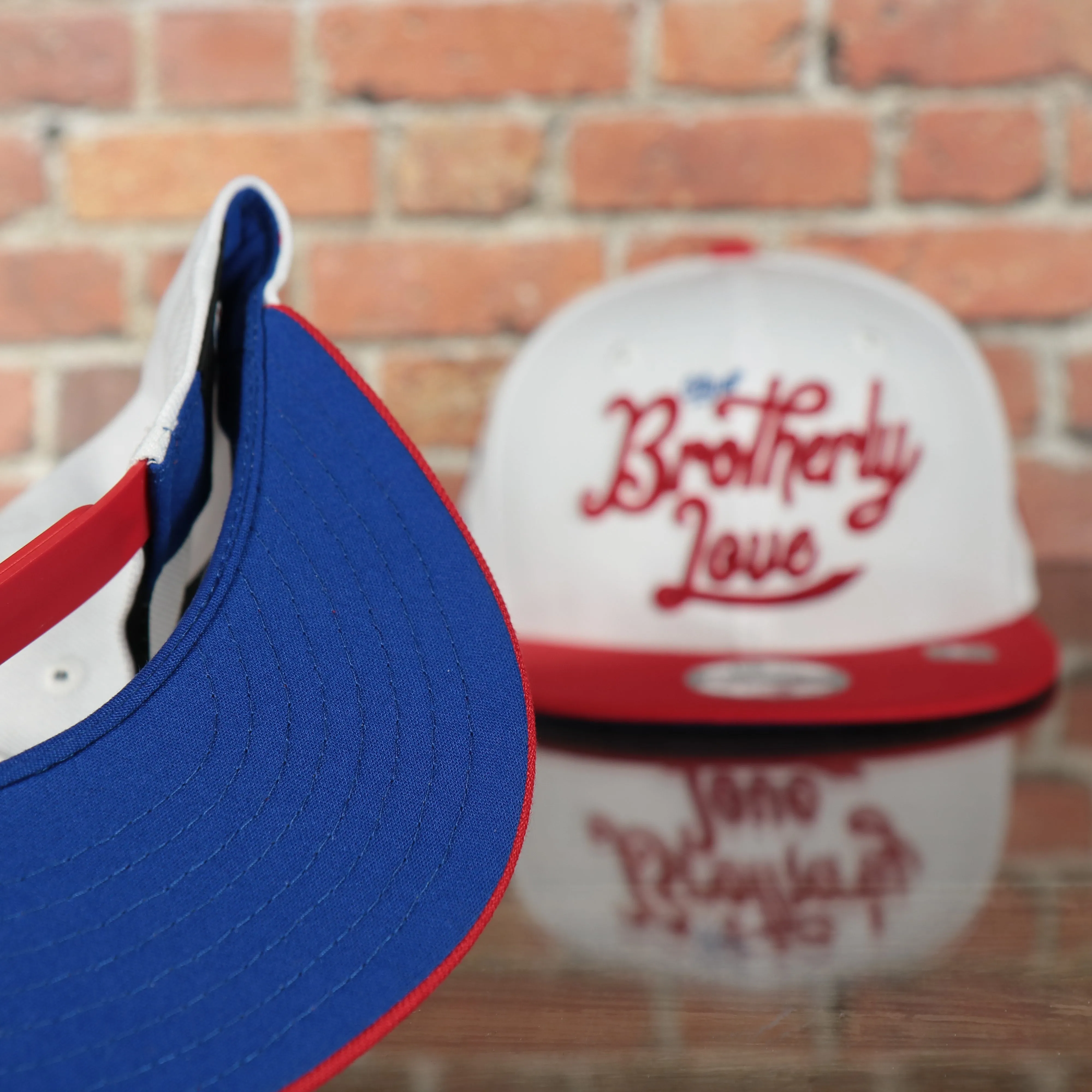 Philadelphia 76ers 2022 City Edition City Of Brotherly Love Blue Bottom Youth 9Fifty Side Patch Snapback Cap | New Era, White