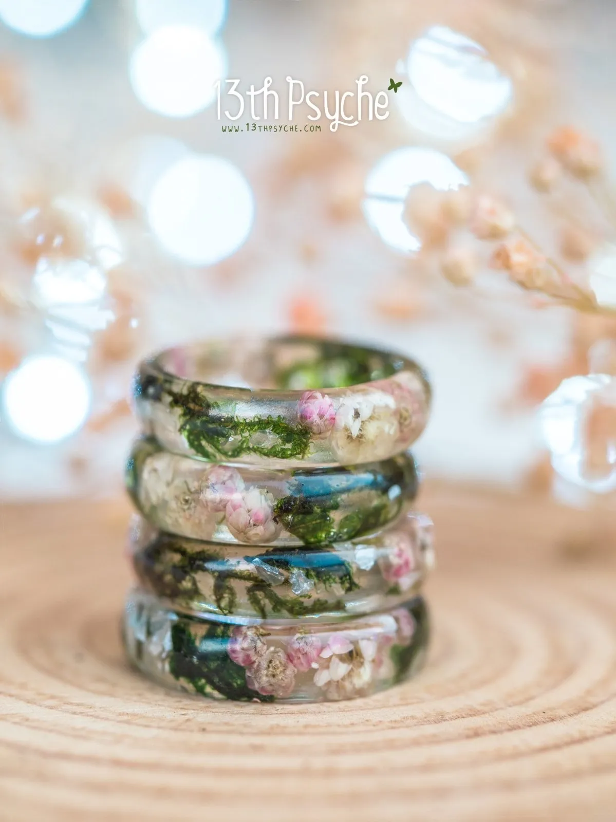 Real moss, Ozothamnus flowers and moonstone resin ring